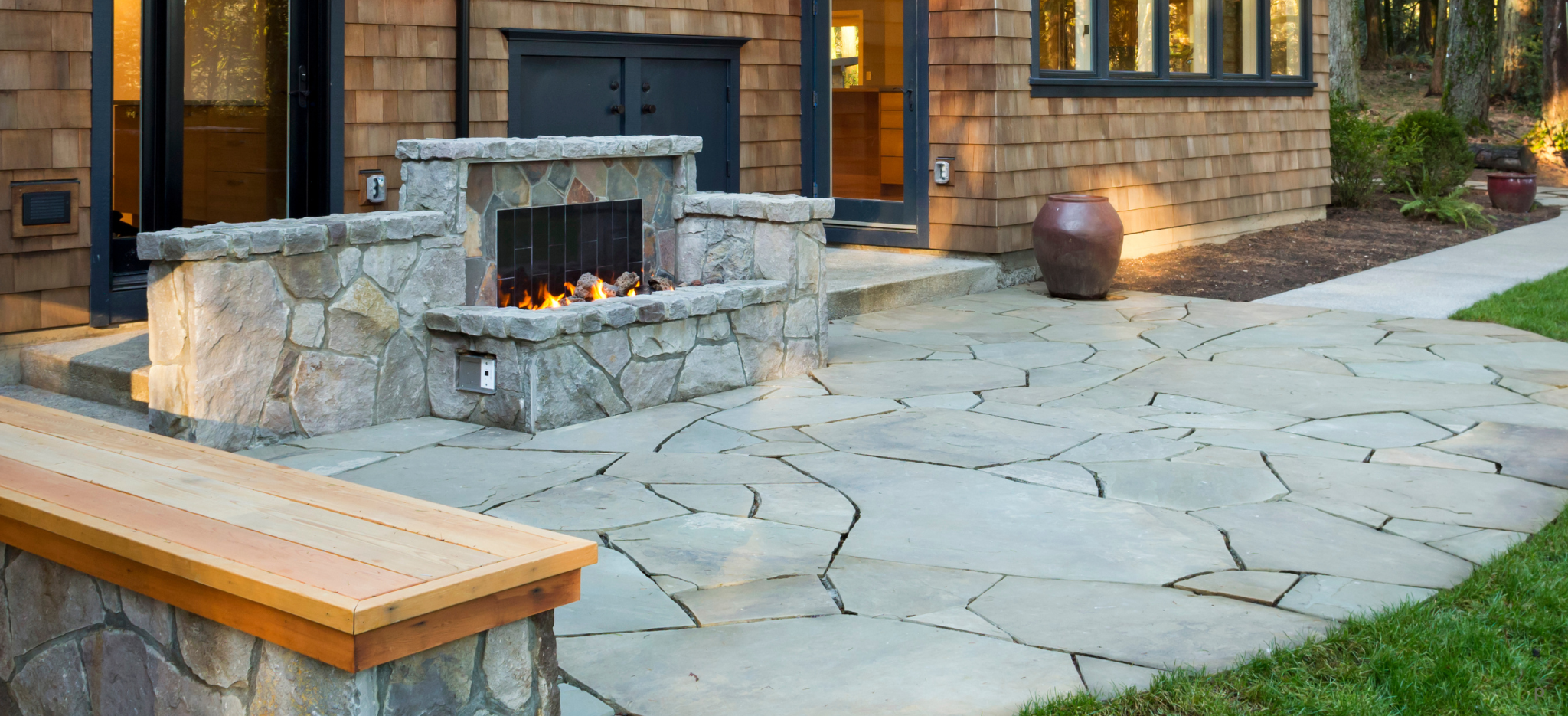 Flagship stone custom luxury patio with pavers